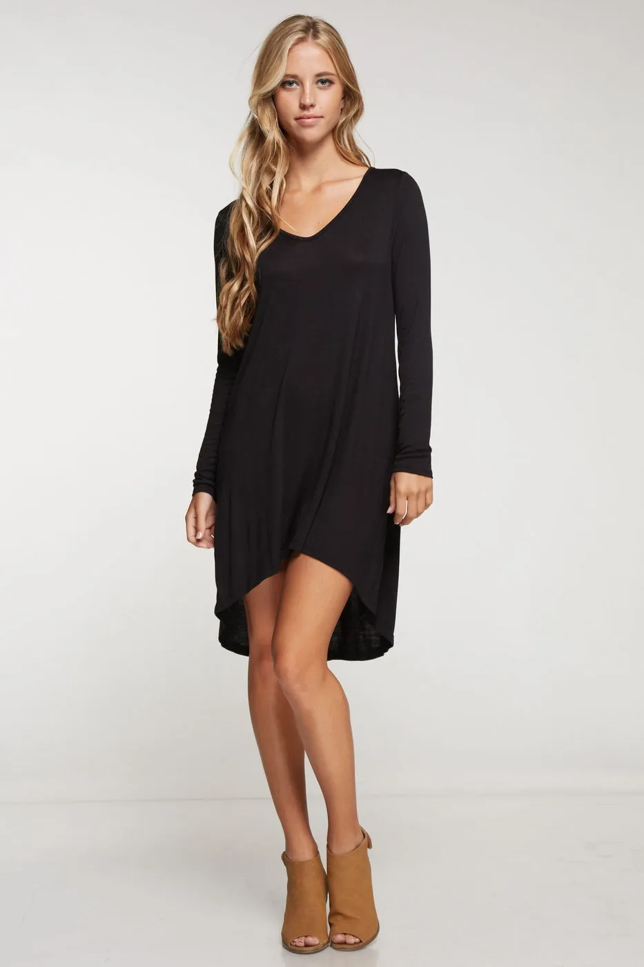 Long sleeve solid knit dress with hi-low bottom hem